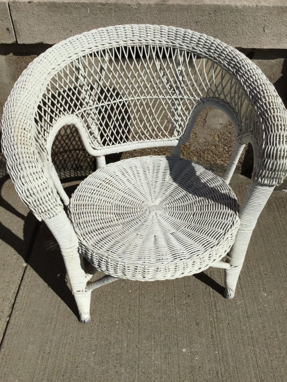 Lot 269: Wicker Chair Measures 29 inches tall by 26 inches wide