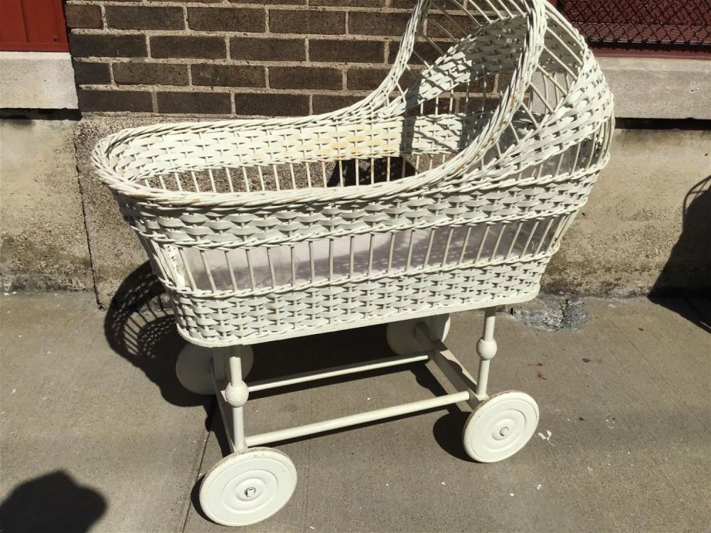 Lot 276: Wicker Baby Carriage Measures 40 inches tall by 41 inches long by 20 inches wide