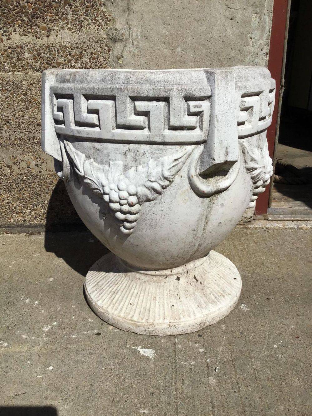 Lot 278: Concrete Planter Measures 17 inches tall by 16 inches diameter
