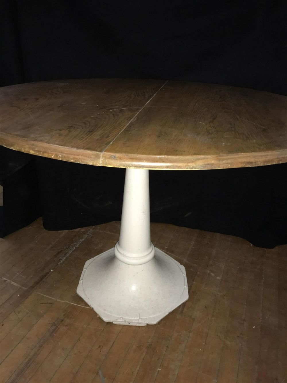 Lot 283: Iron Base Table Measures 29 inches tall by 42 inches diameter
