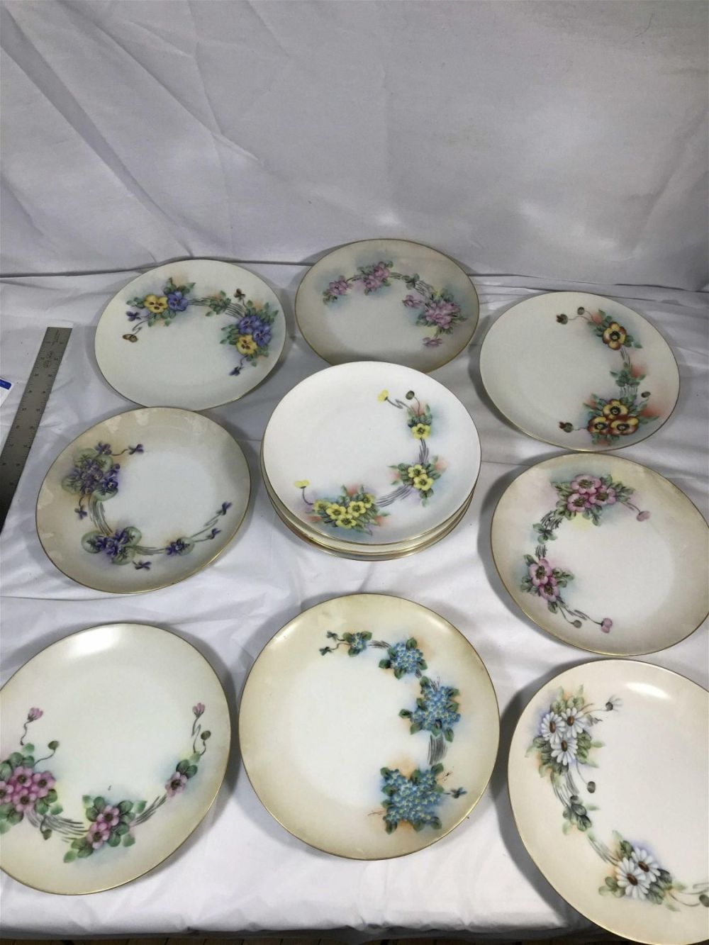 Lot 296: Hand Painted Victorian Bavaria Plates (12) .