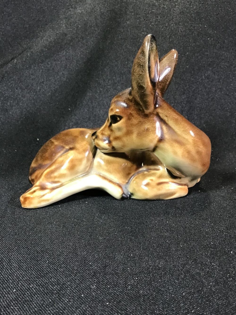 Lot 184: Porcelain Deer Measures 4 inches tall by 6 inches wide