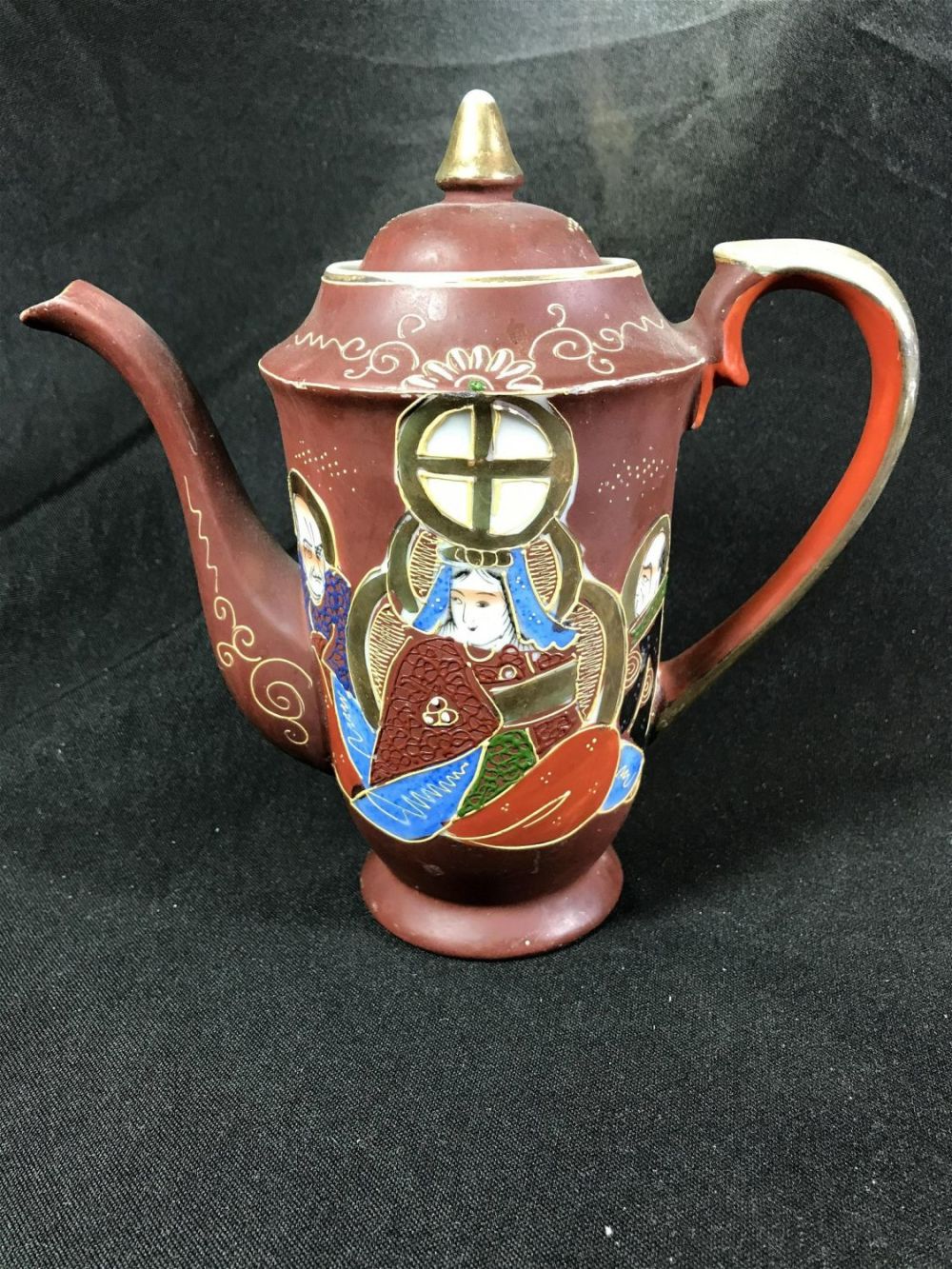 Lot 187: Hand Painted Geisha Tea Pot Measures 7.5 inches tall by 7.5 inches wide