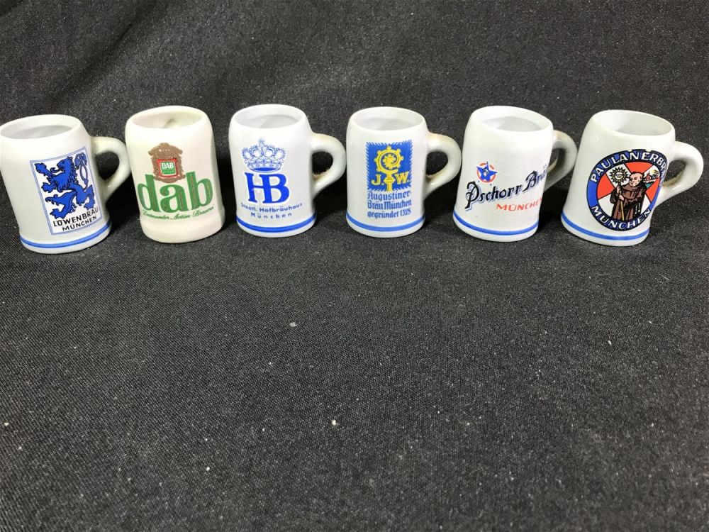 Lot 192: Advertising Beer Mug Collection Each measures 2 inches tall