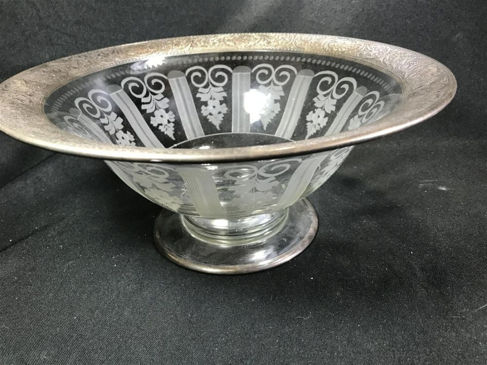Lot 195: Sterling wrap Centerpiece, carved Crystal Measures 5 inches tall by 12 inches diameter