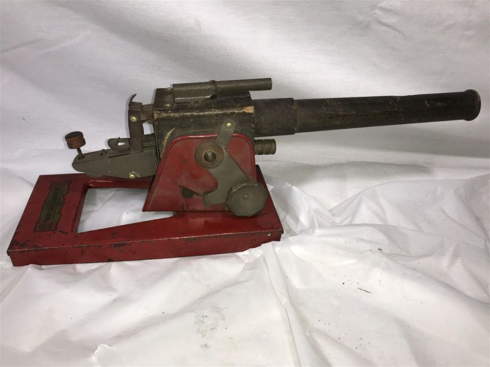 Lot 167: Baldwin Manufacturing Co. Cannon Wood & Metal Measures 6 inches tall by 17 inches long