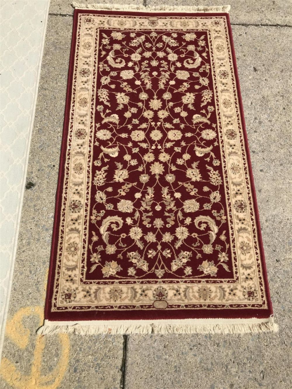 Lot 188: Persian Renaissance Area Rug Measures 62 inches by 31.5 inches