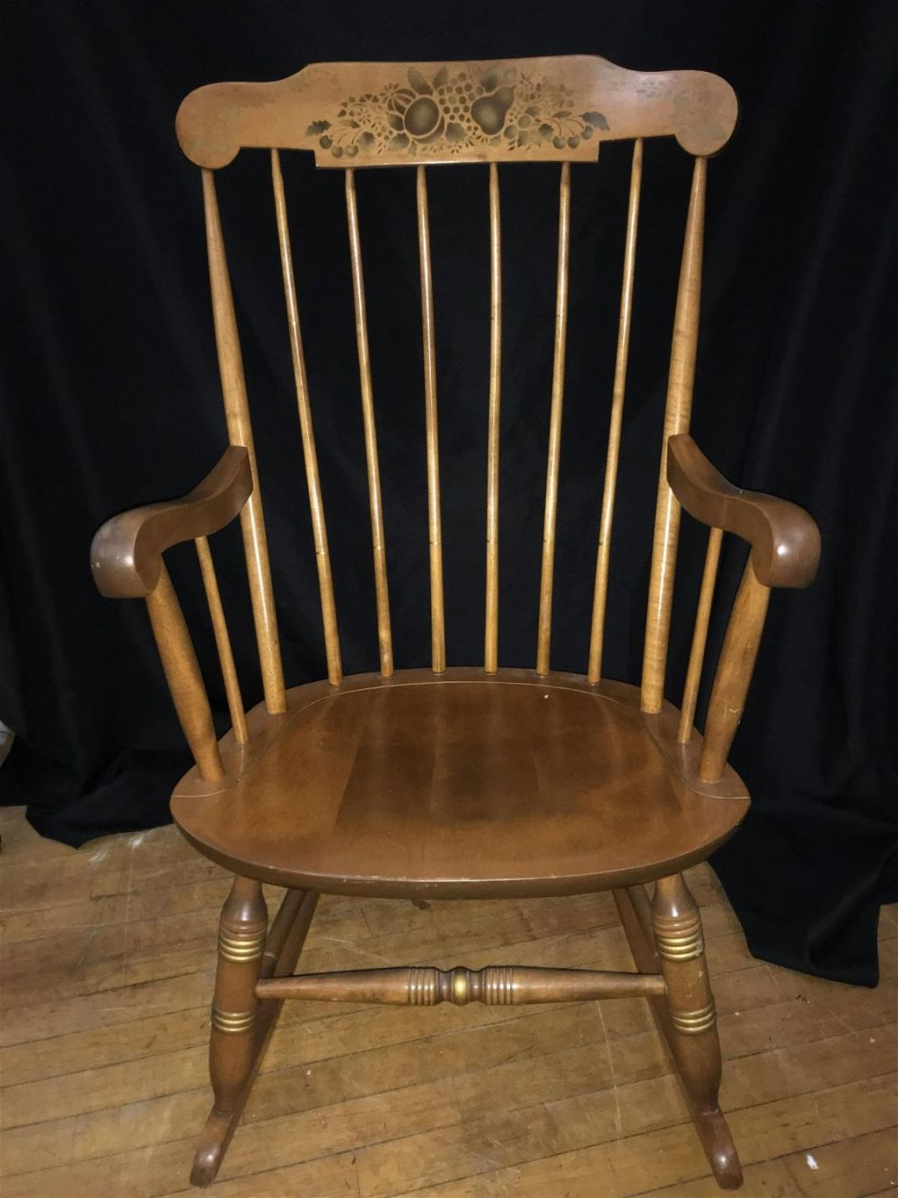 Lot 219: Hitchcock Style Rocker Measures 40 inches tall 15 inches tall to the seat by 29 inches long
