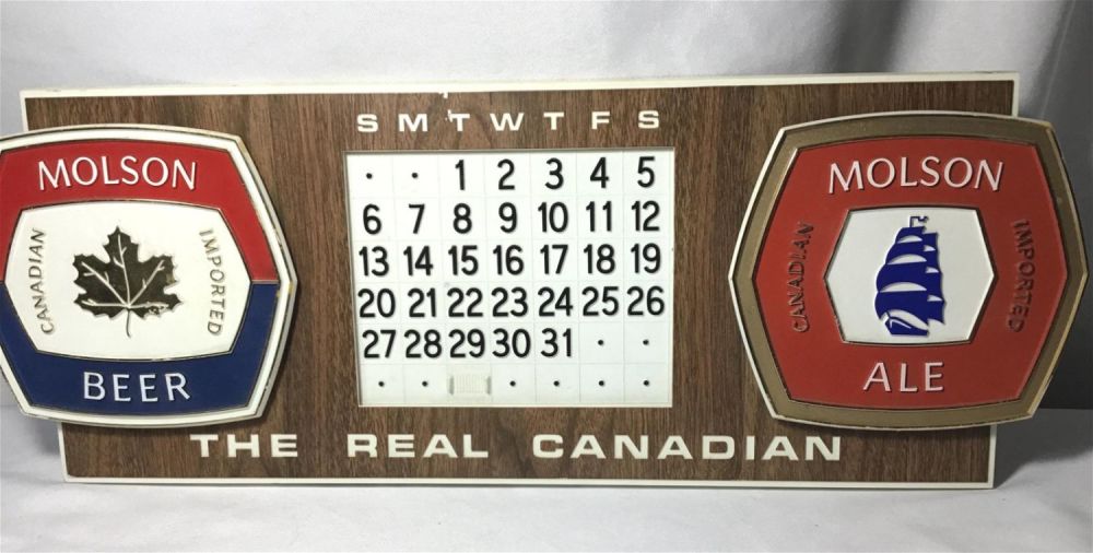Lot 168: Molson Canadian Beer Advertisement Calendar  Measures 21.5 x 8 inches
