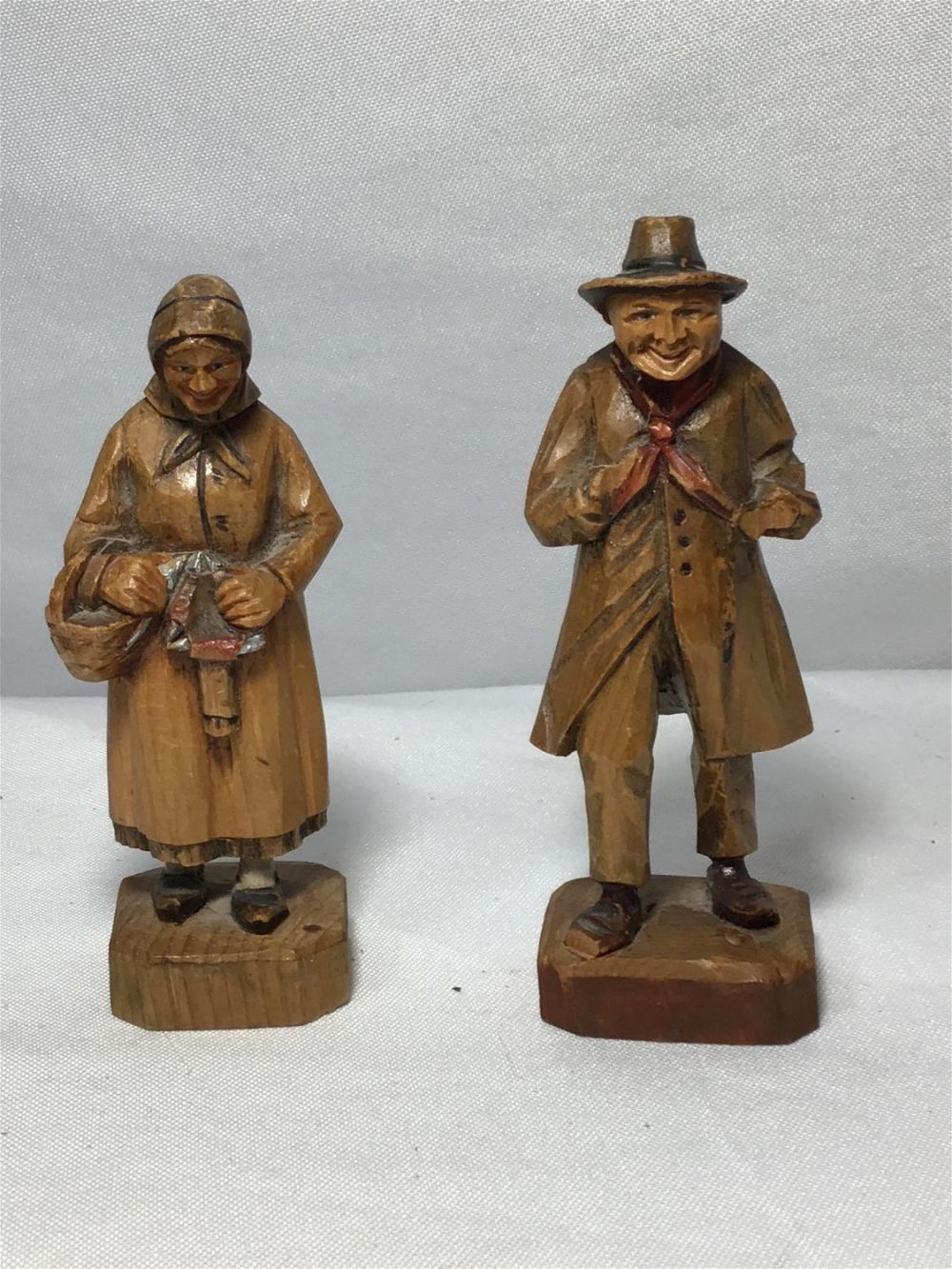 Lot 174: Wooden Carvings by P Maeder Switzerland  Man & Woman figures Each measures 4.5 inches tall