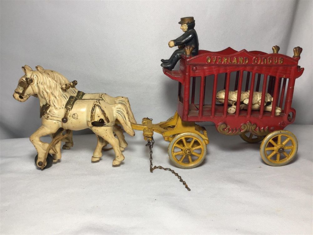 Lot 184: Vintage Overland Circus Wagon Toy Measures 8 inches tall by 14 inches long