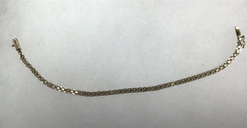 Lot 164: 14K Gold Bracelet - Woven Measures 7.5 inches