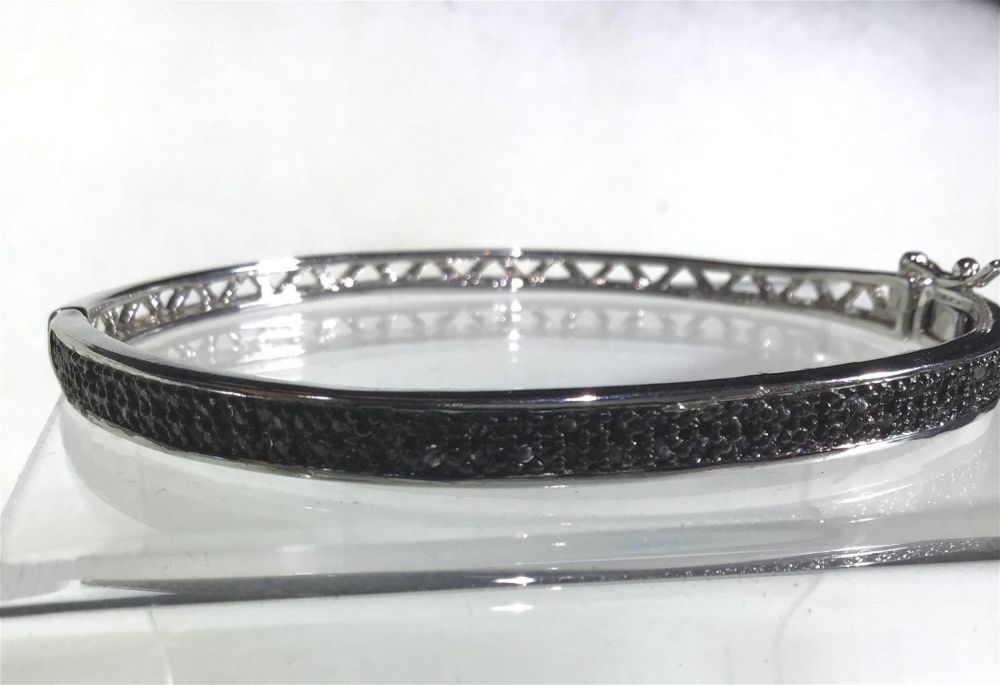 Lot 169: Black Diamonds Sterling Bangle w/ Safety Clasp .
