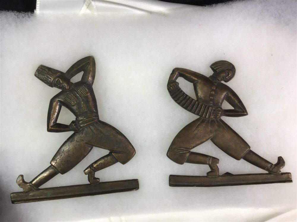 Lot 173: Russian Dancers Bookends Solid Brass Each measures approximately 5 inches tall by 5 inches wide