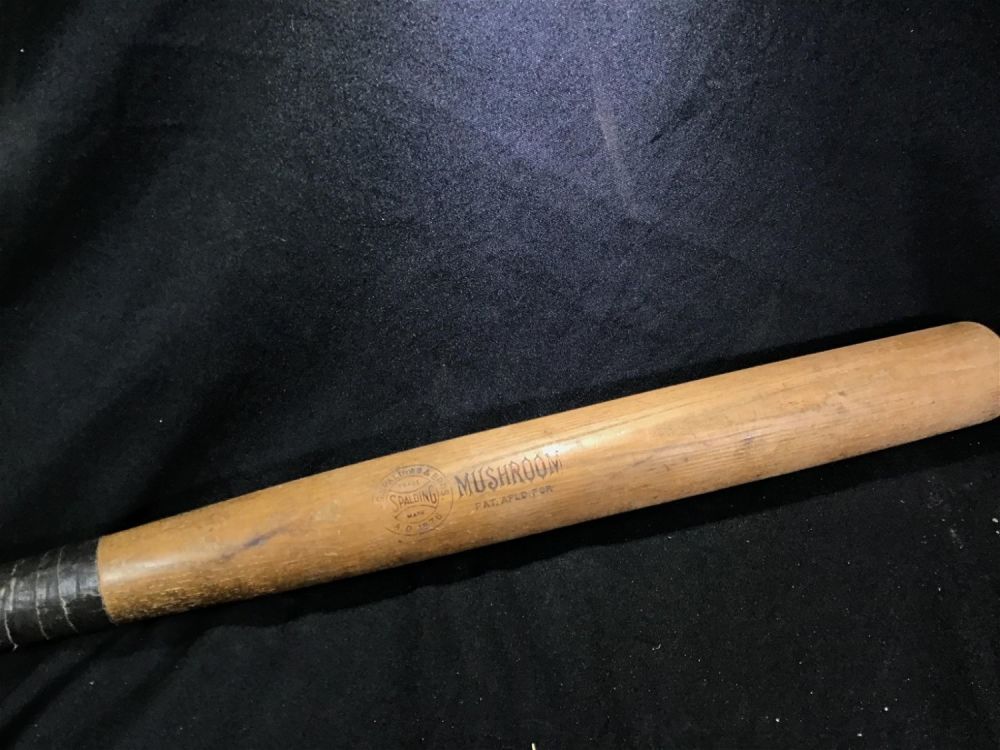 Lot 177: Early 1900's Spalding Mushroom Bat Measures 33 inches long
