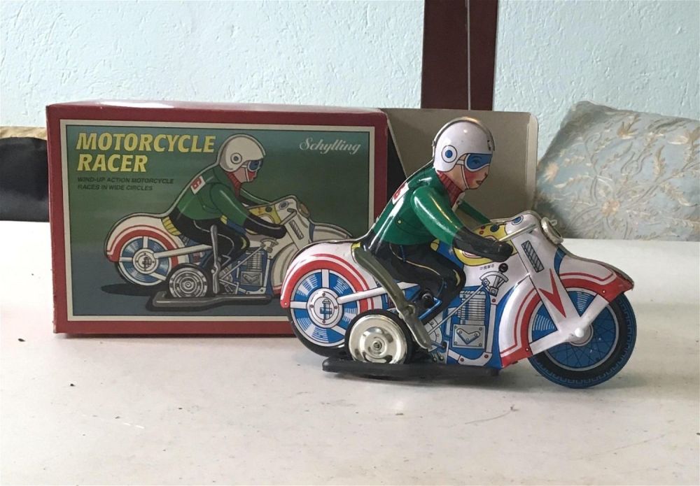 Lot 156: Schylling Collectible motorcycle racer toy .