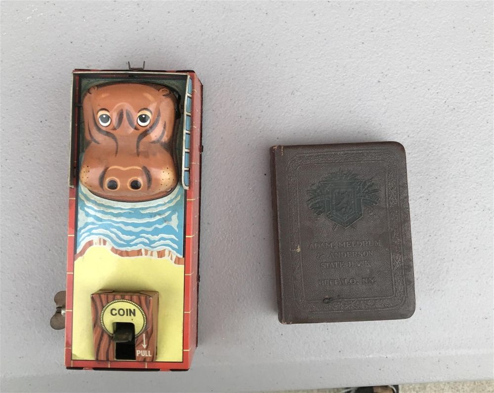 Lot 162: Vintage Coin Banks Hippo Bank and City of Buffalo book bank