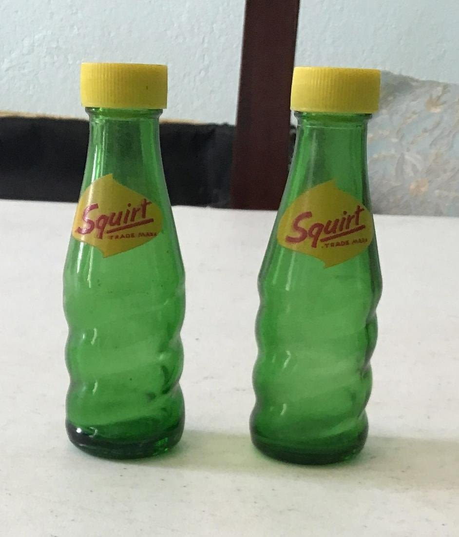 Lot 180: Vintage Squirt Salt and Pepper Shakers .