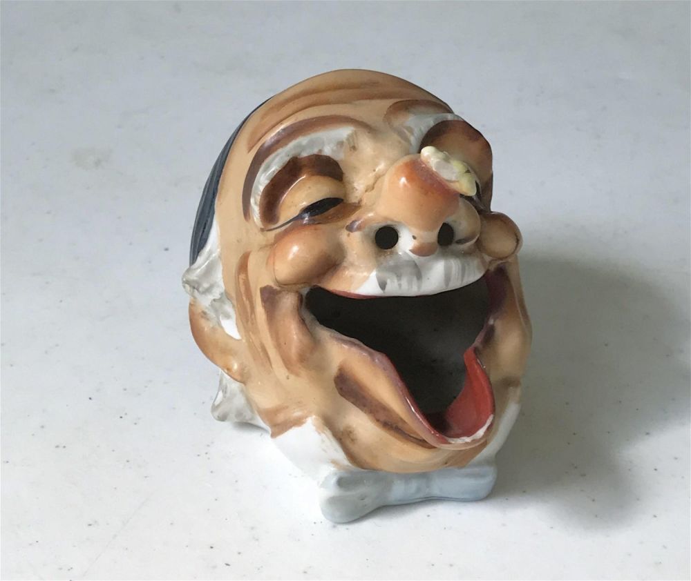 Lot 181: Vintage hand painted ceramic head .