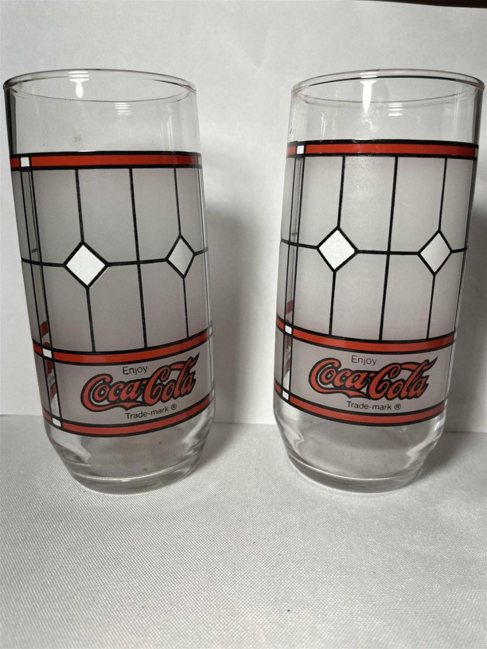 Lot 209: Vintage Pair of Coca Cola Tumblers .