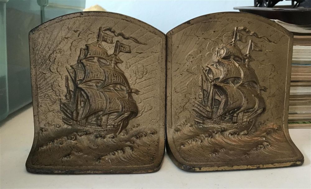 Lot 221: Vintage Iron and with sale ship on the France measures to be 5 inches across approximately 6 inches