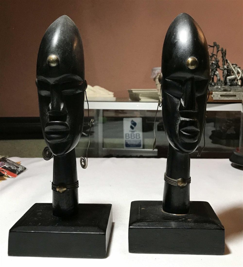 Lot 163: Vintage Decorative African Heads (2) Hagenhauer-style, set of two. Measures to be  9inches tall with