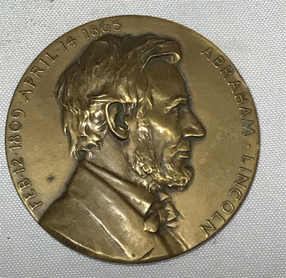 Lot 169: Commemorative Abraham Lincoln Penny diameter of 2 3/4â€