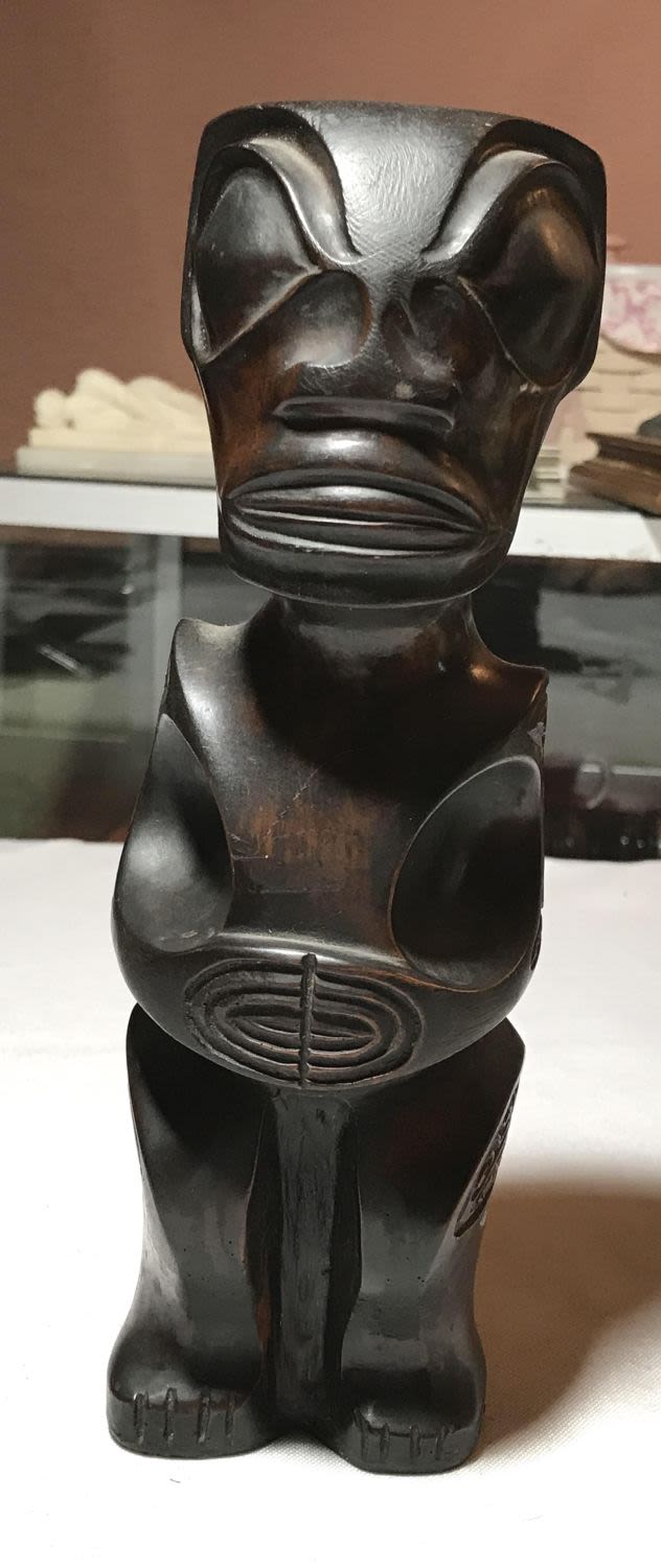 Lot 171: Vintage Hawaiian Wooden Statue measures to be to be approximately 8 1/2 inches tall 3 inches across