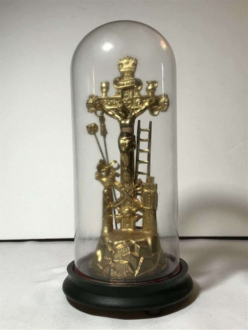 Lot 176: Vintage Religious Statue in Glass Measures to be approximately 12 inches tall with a base diameter