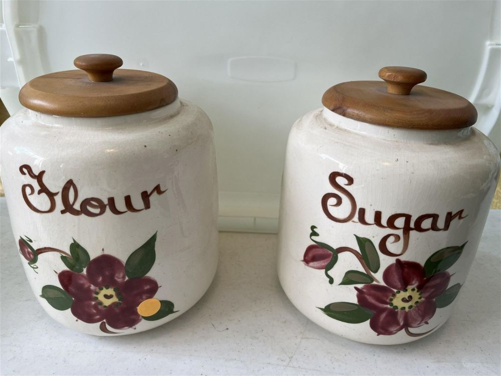 Lot 204: Vintage Flour & Sugar Canisters Each measures approximately 8.5 inches tall