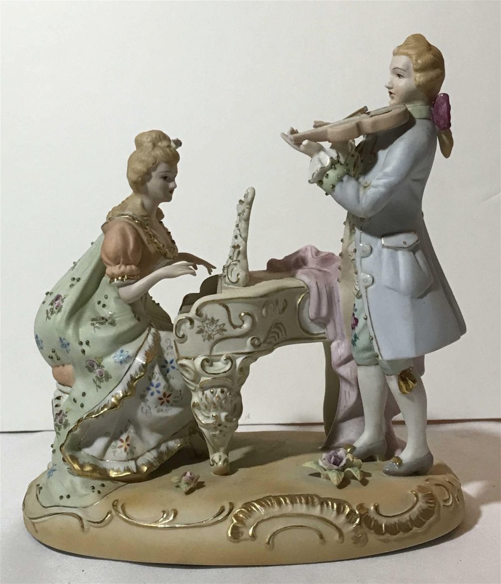 Lot 205: Vintage Musical Statue Corday-syle Measures to be and 9 1/2â€œ x 9â€œ x 6â€œ
