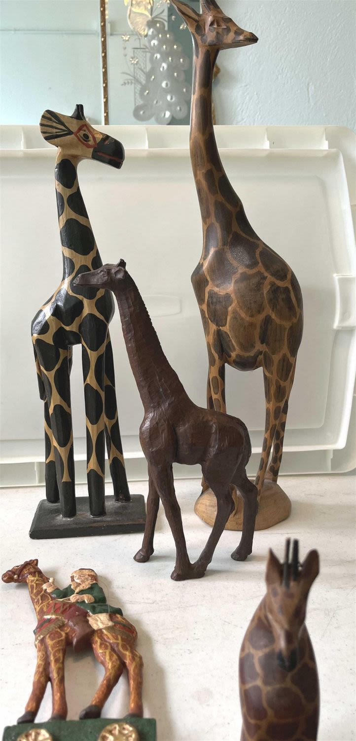 Lot 212: Wooden Giraffe Collection 5 total Tallest measures approximately 20 inches tall