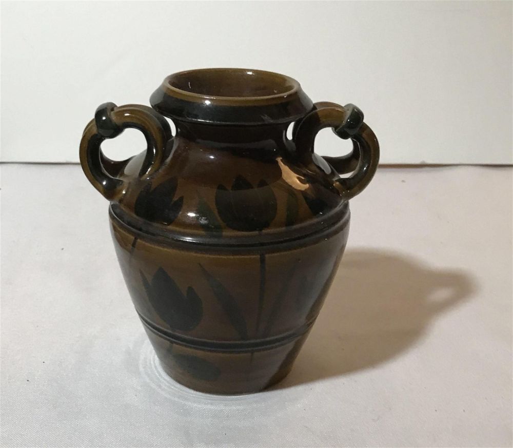 Lot 222: Vintage Italian pottery vase with two handles Measures 6 inches tall 6 inches wide depth is 4 1/2