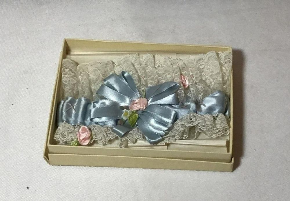 Lot 149: Vintage Hand Sewn Wedding Garter .