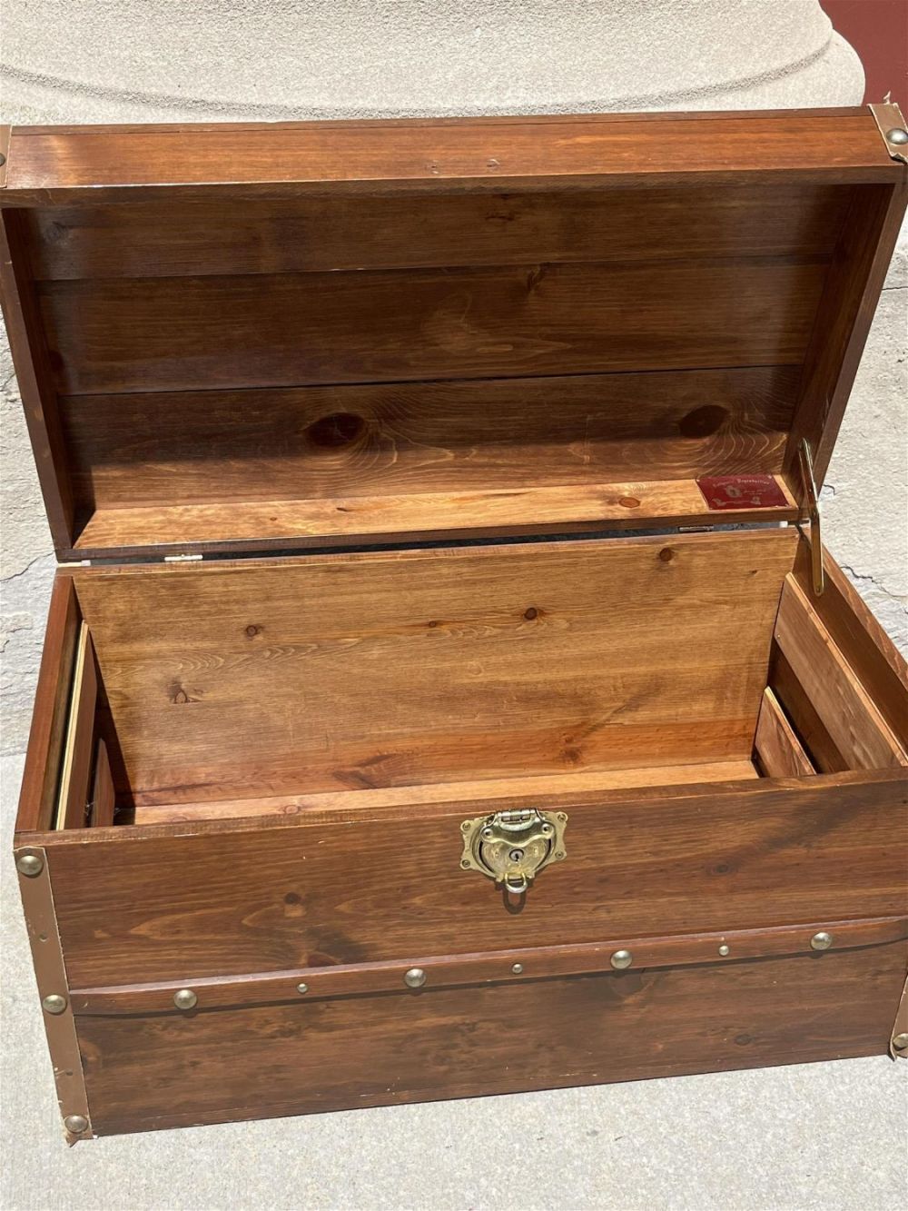 Lot 209: Jenny Lind Trunk Reproduction Toy chest/shipping trunk -  needs new