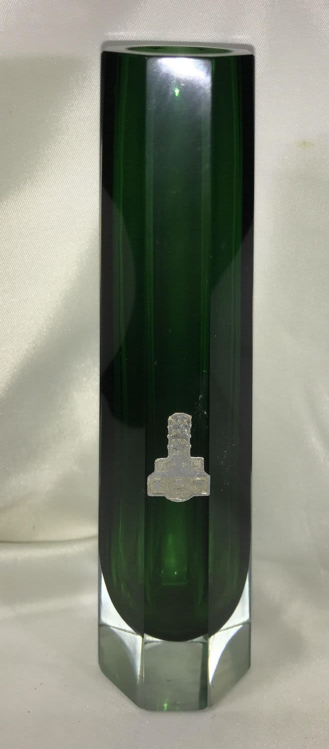 Lot 182: Kryptonian Green Vase Dealer's Stamp  Measures 8 inches tall by 2.5 inches wide at base