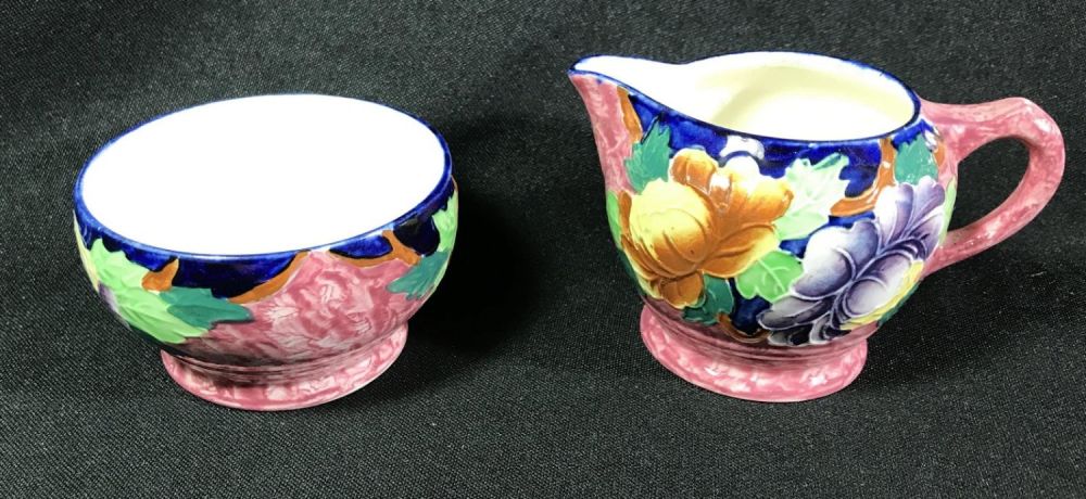 Lot 191: Vintage Malinc Cream & Sugar Creamer measures approximately 3.5 by 2.5