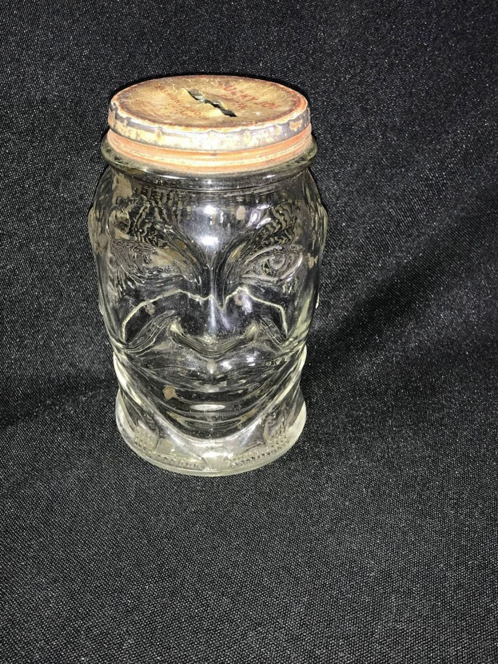 Lot 194: Vintage Lucky Joe Glass Face Bank Measures 4.5 inches tall