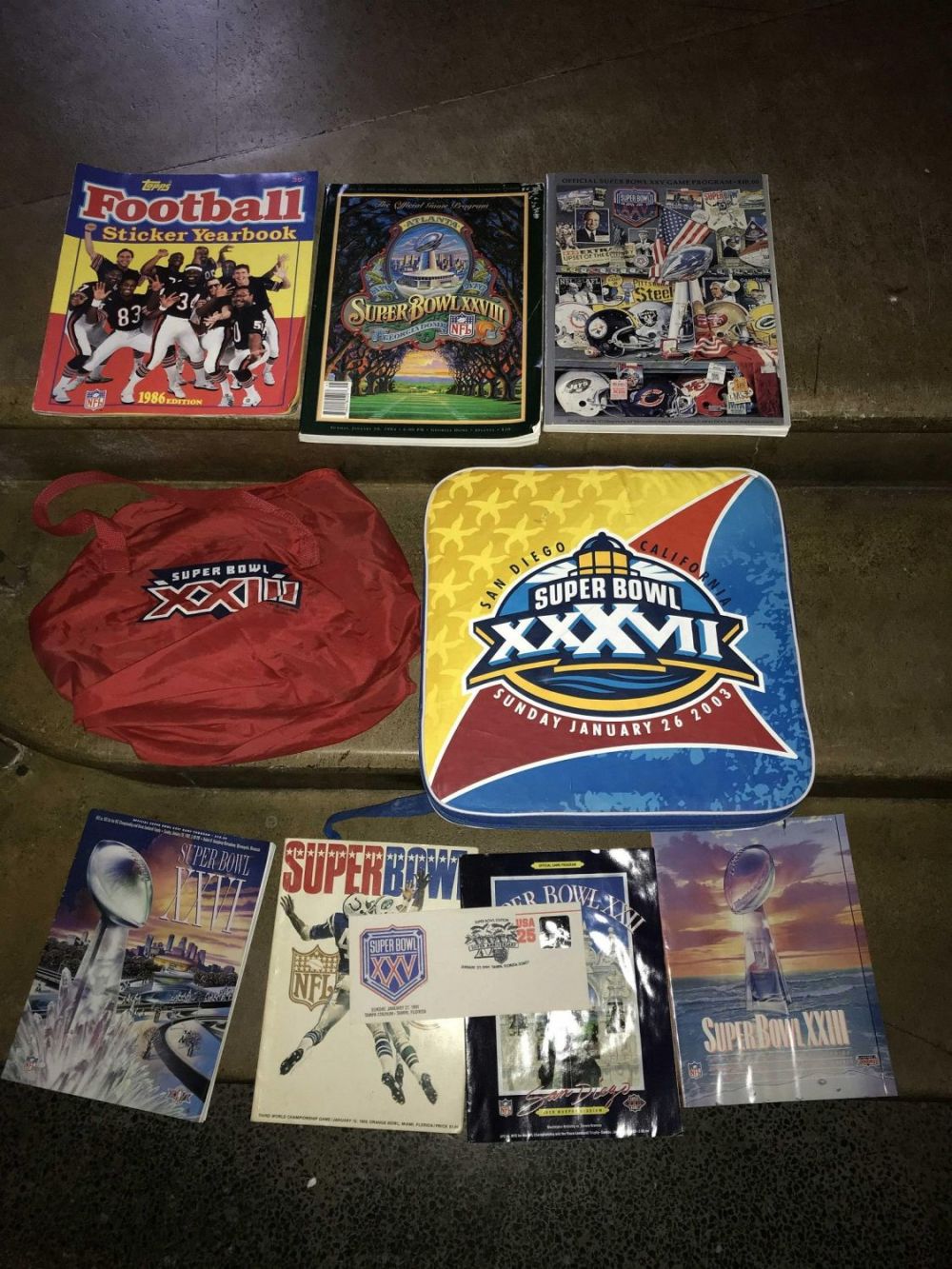 Lot 212: Super Bowl Collection Magazines, seat pad & bag