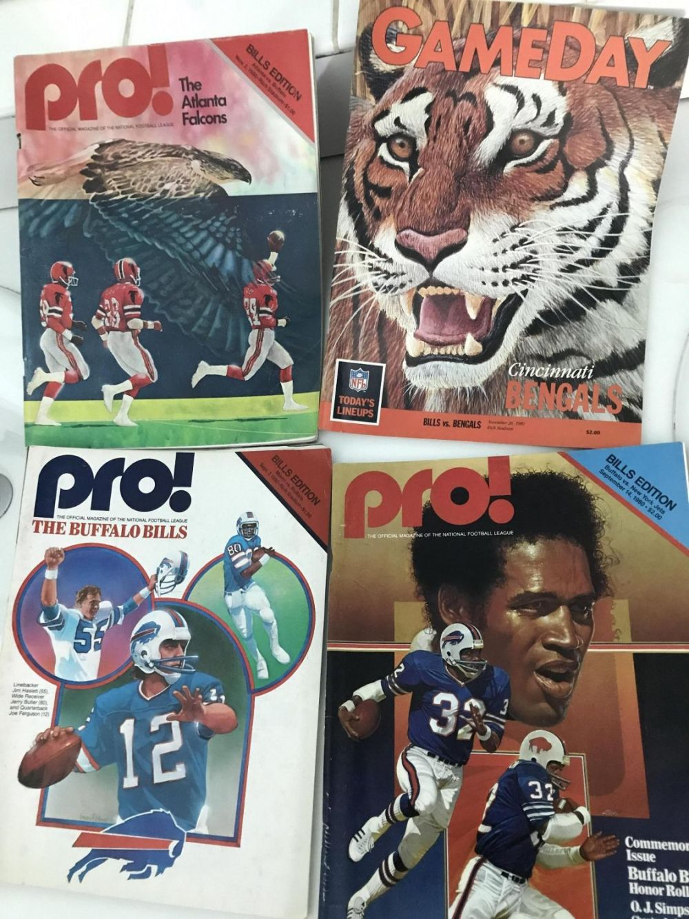 Lot 231: Vintage NFL Magazines (4) Gameday & pro! OJ Simpson Issue
