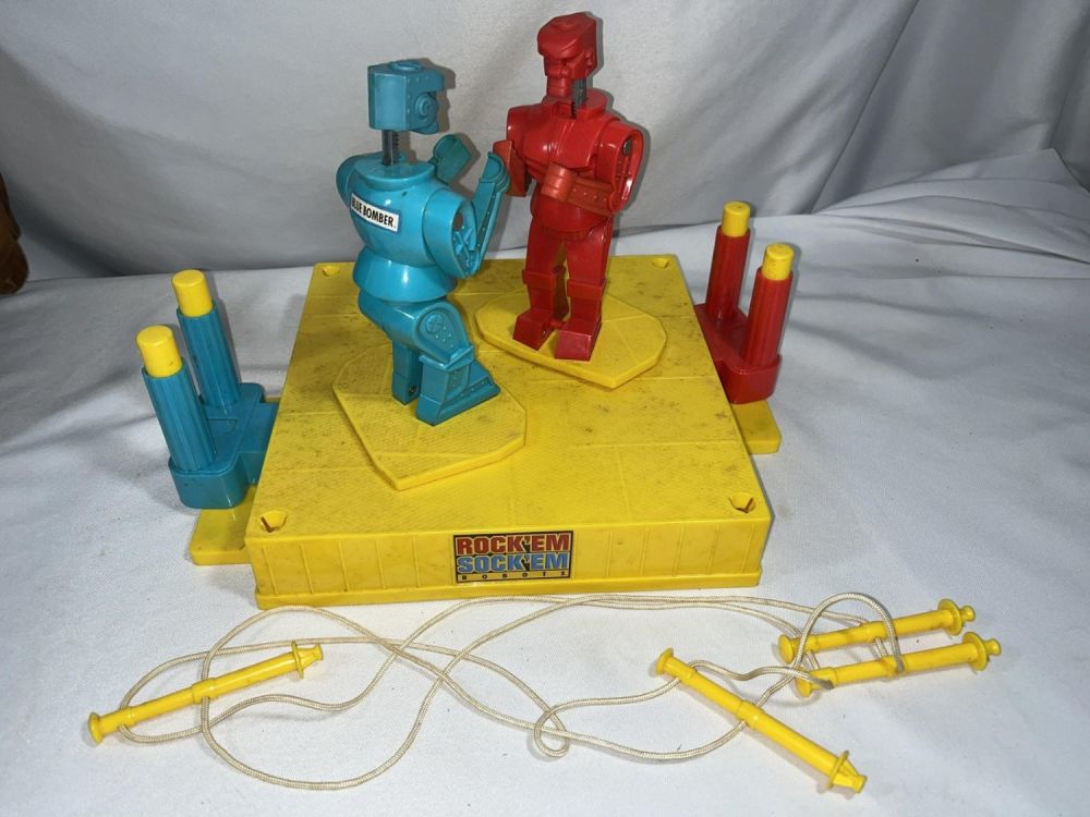 Lot 241: Vintage Rockâ€™em Sockâ€™em Robots Includes everything pictured