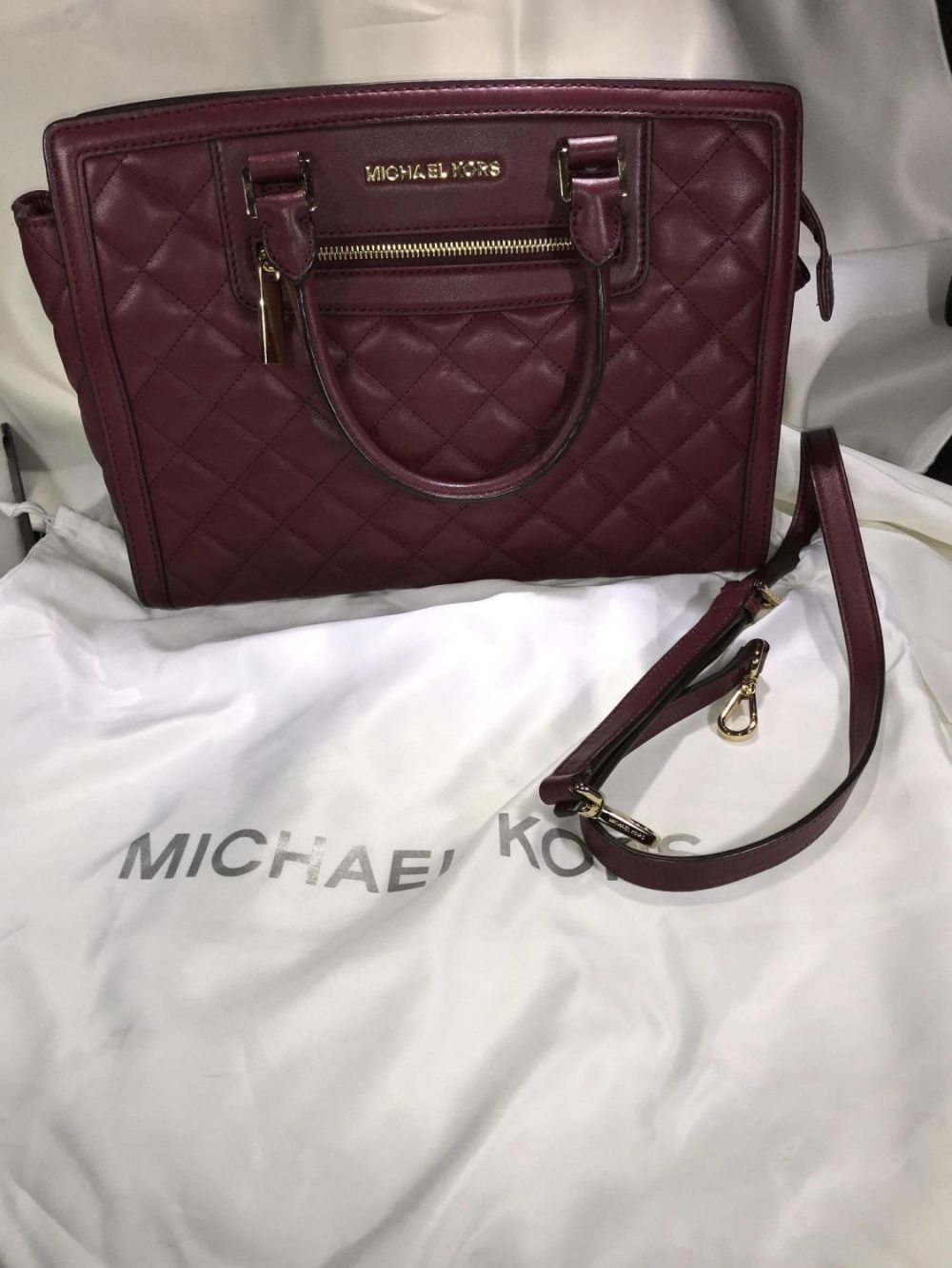 Lot 157: Michael Kors Maroon Purse w/ Dust Cover .