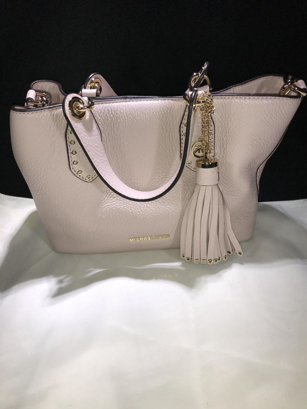 Lot 164: Michael Kors Pale Pink Purse w/ Tassel Shoulder Strap