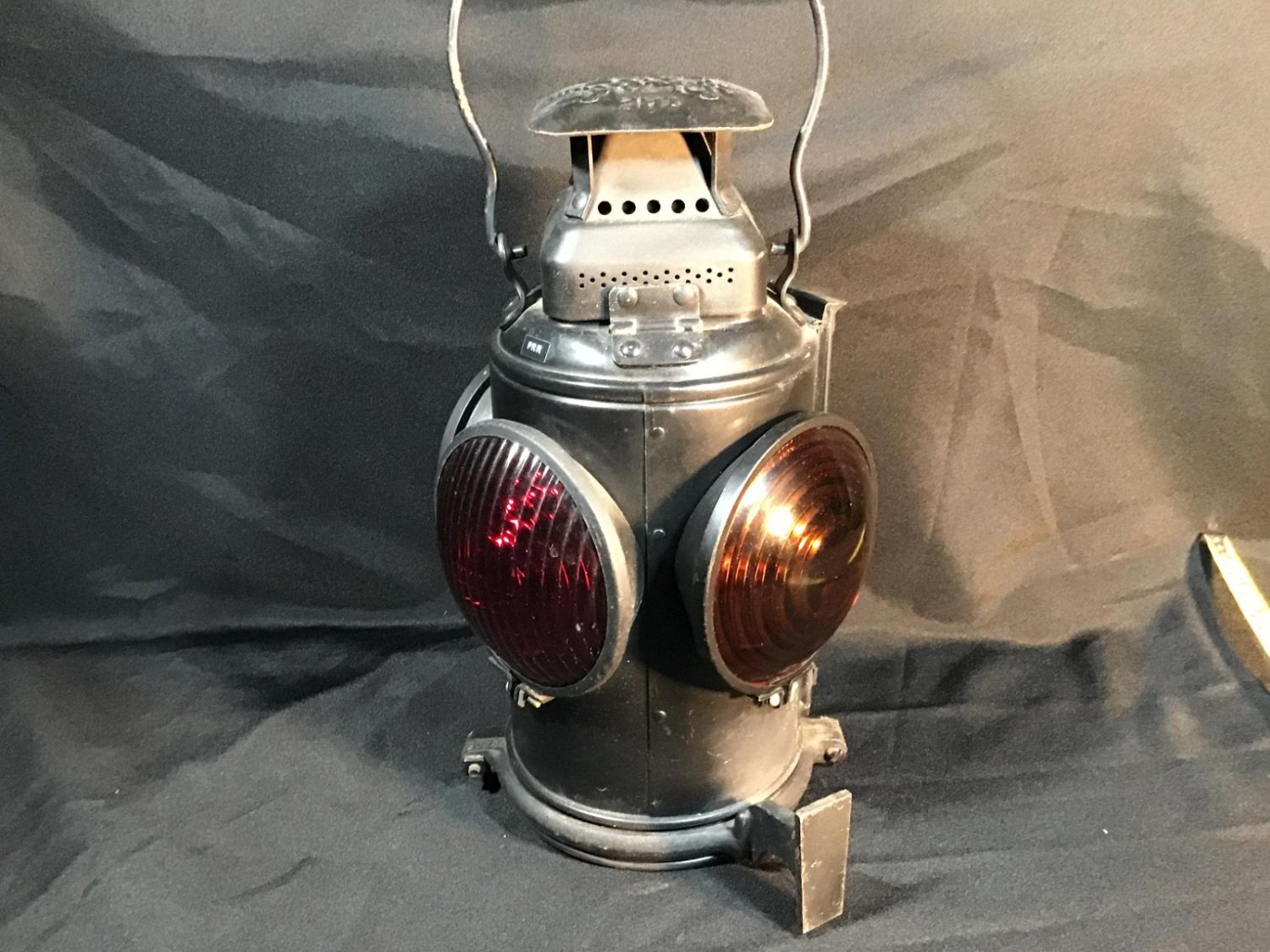 Lot 59 Pennsylvania railroad lantern three lens castiron mounting