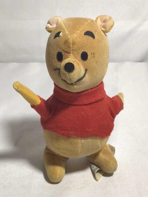 Lot 210: Vintage Winnie the Pooh by Gund & Eeyore the Donkey   H 6 1/2