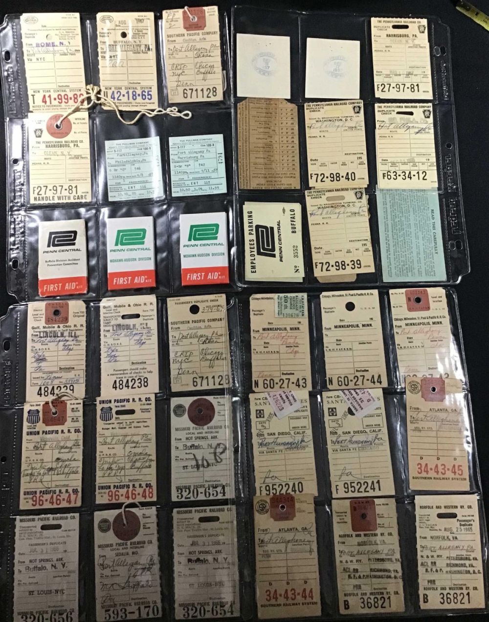 Lot 170: Vintage assorted Baggage Tags and First Aid Kits .