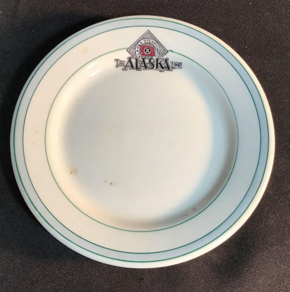 Lot 215: Vintage Alaskan steamship dessert plates .
