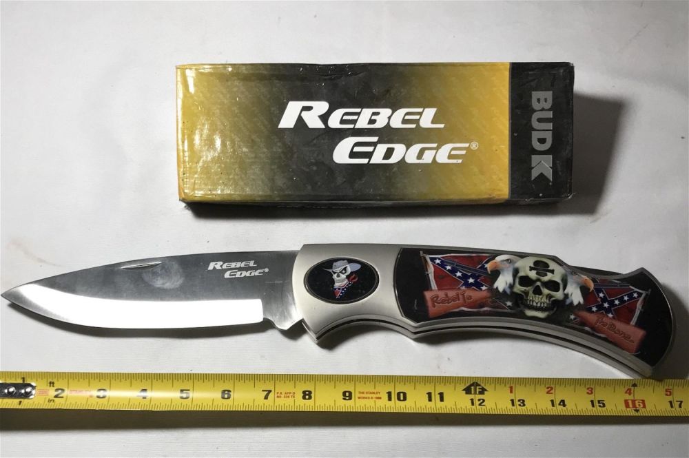 Lot 169: Rebel Edge Folding Knife in org box .