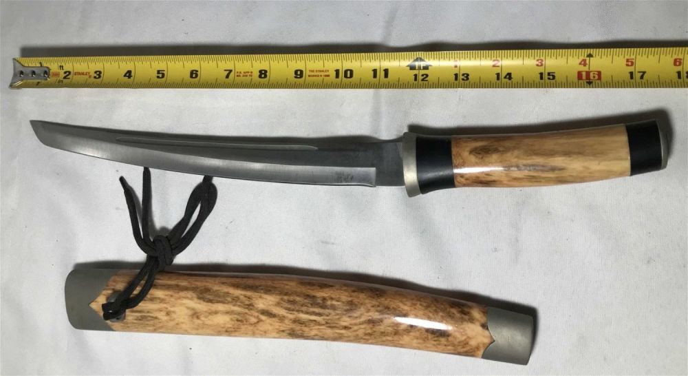 Lot 181: 12 inch knife with wooden handle and wooden scabbard