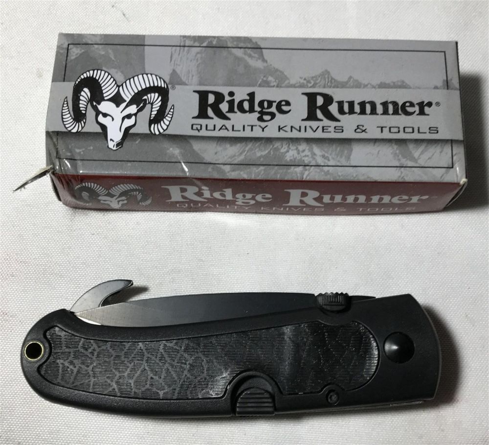 Lot 204: Ridge Runner Pocket Knife in org box .